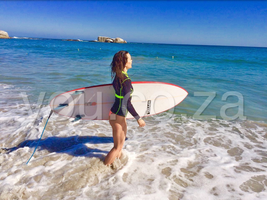 KIMBERLEIGH GELBER SURFING IN CAMPS BAY, CAPE TOWN, SOUTH AFRICA